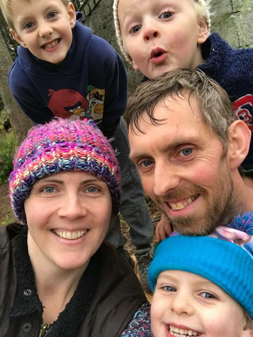 Image of the Wilson family in a selfie position